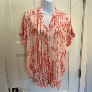 Orange patterned blouse